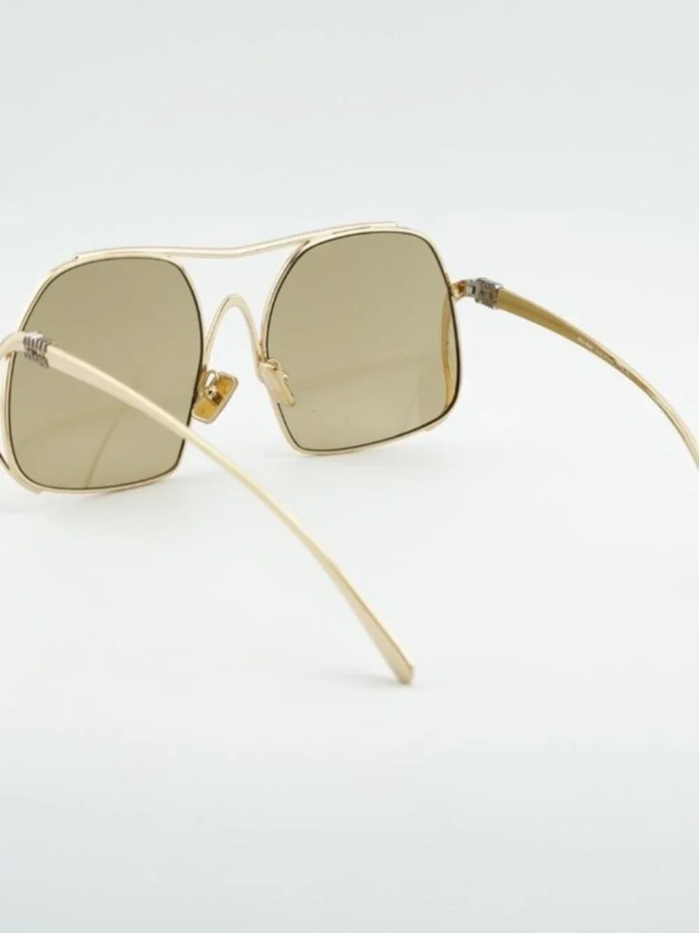 Miu Miu MUA55S 5AK10R Sunglasses Gold Geometric Frame, Yellow Lenses